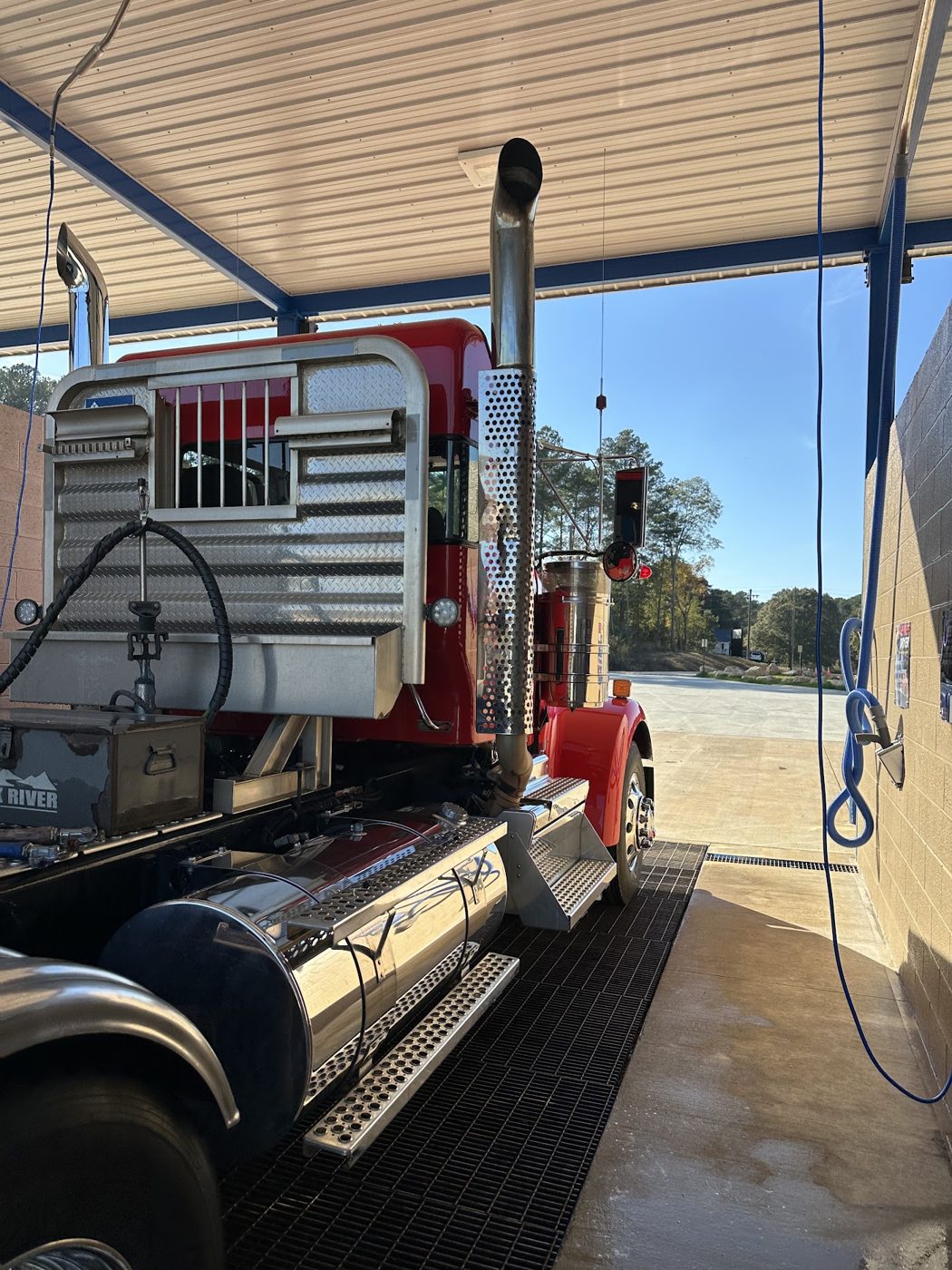 Semi tractor in a wash bay